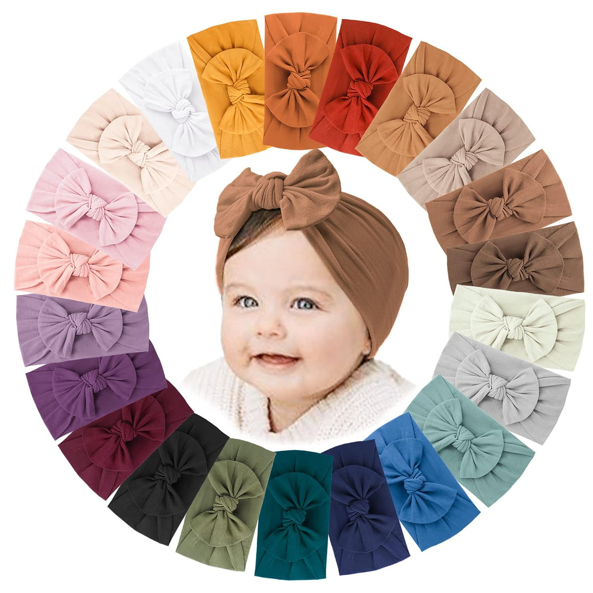 Collection of 22 soft fabric baby headbands with knotted bows arranged in a circle around a smiling baby wearing a brown bow headband. Colors range from white, pink, and lavender to teal, navy, olive, and rust.