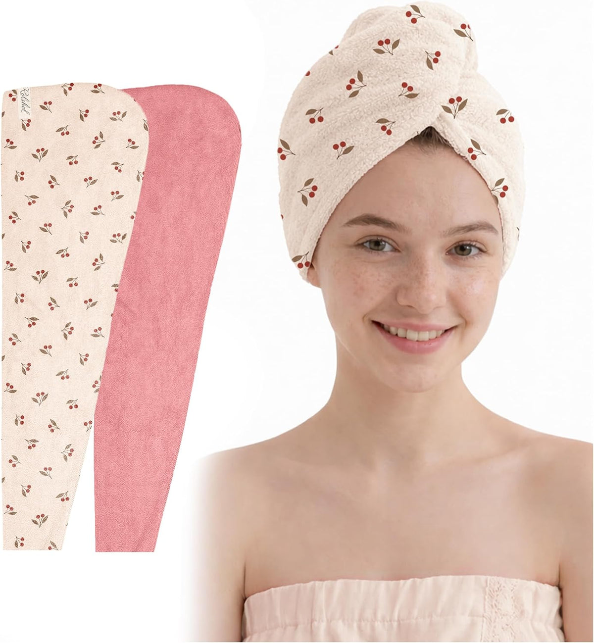 Two hair towel wraps laid flat on the left: one cream with red cherry print, one solid pink. On the right, a smiling woman wears the cherry-print towel twisted into a turban on her head.