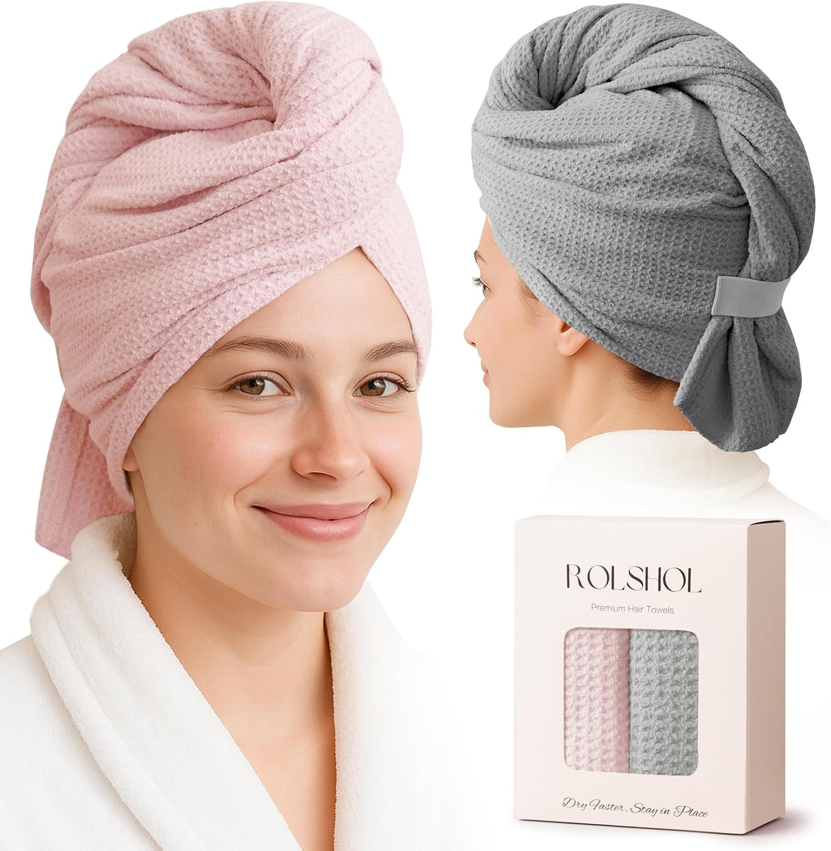 Two models wearing waffle-textured hair towel wraps: one facing forward in pink, one shown from behind in gray, both wearing white robes. A product box labeled 'ROLSHOL Premium Hair Towels' with both colors is shown in the lower right.
