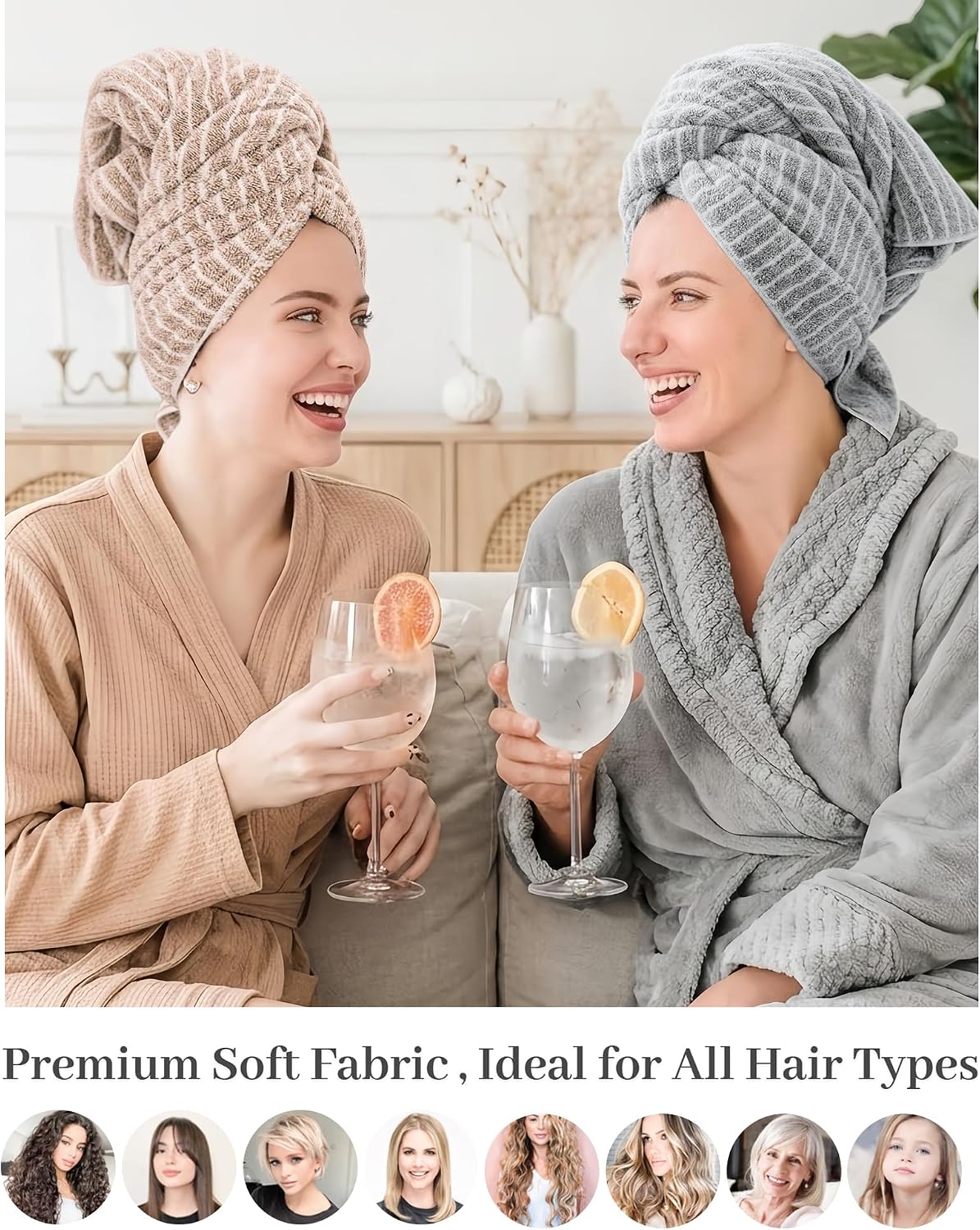 Two women in robes wearing hair towel wraps -- one beige/tan with a textured pattern, one gray with ribbed stripes -- laughing and holding wine glasses. Text below reads 'Premium Soft Fabric, Ideal for All Hair Types' with circular hair-type portraits.