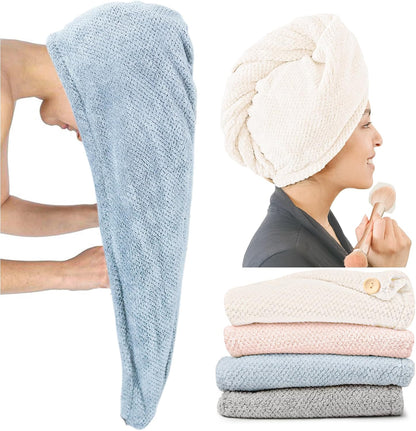 Microfiber hair towel wraps shown in three panels: a blue wrap held open, a cream wrap worn turban-style on a woman's head, and a stack of four folded wraps in cream, pink, blue, and gray with a visible button closure.
