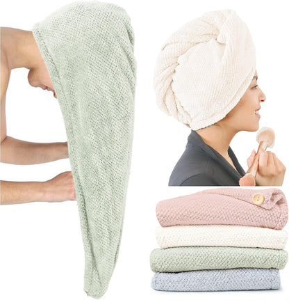 Microfiber hair towel wraps shown in three panels: a sage green wrap held open, a cream wrap worn turban-style on a woman applying makeup, and a stack of four folded wraps in pink, cream, sage green, and gray, each with a button closure.