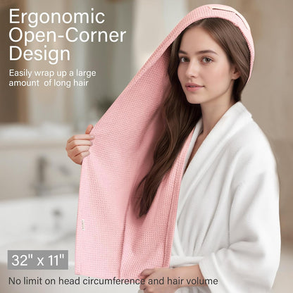 Pink waffle-weave hair towel wrap shown in use on a woman with long hair, wearing a white robe. Text reads 'Ergonomic Open-Corner Design' and dimensions 32" x 11". Waffle texture visible.
